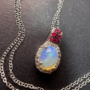Ethiopian opal, ruby and zircon pendant and chain in platinum over sterling